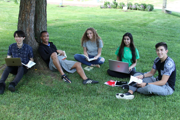 RCC Students sitting in the Peace Garden.
